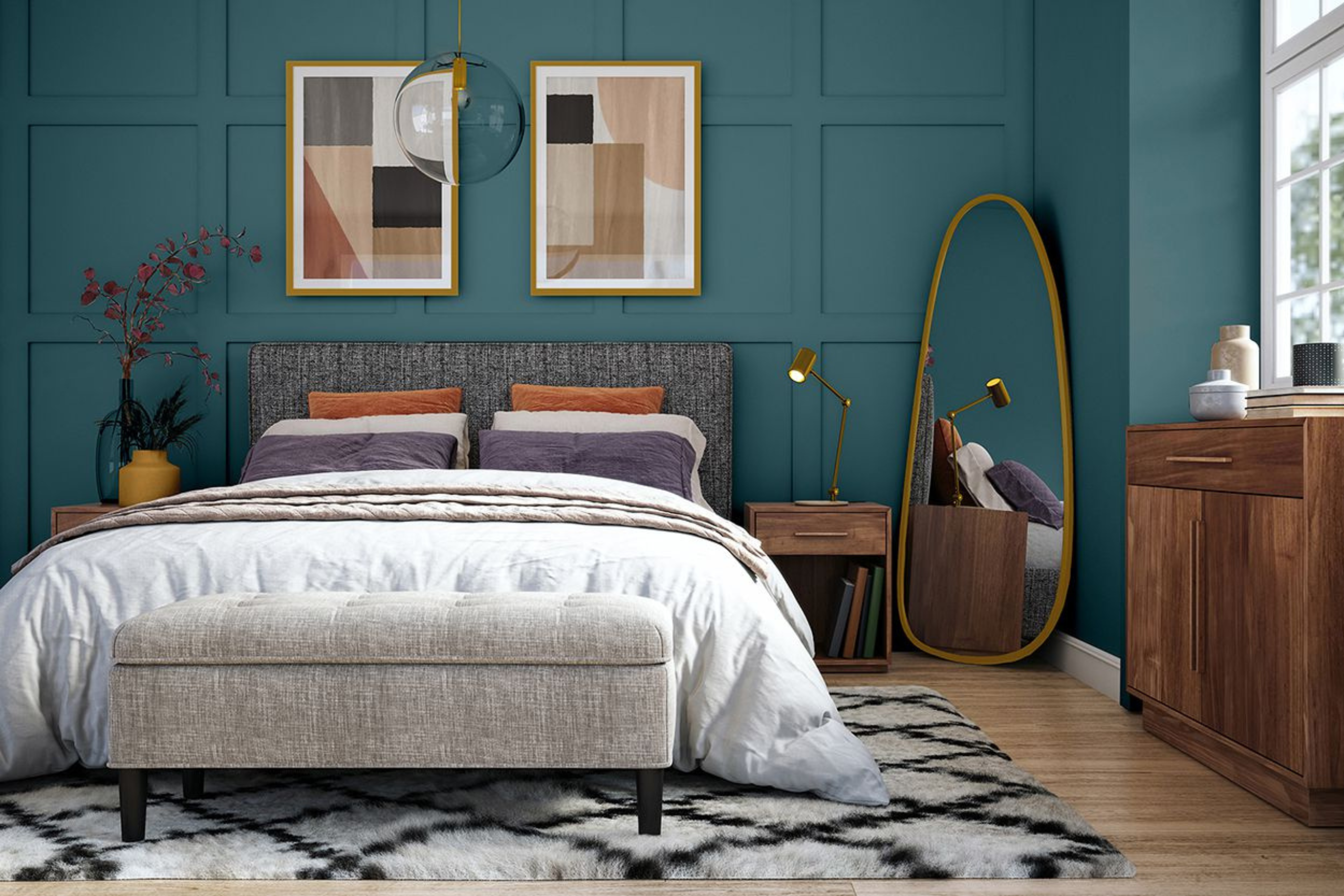 A bold bedroom with a blue feature wall is a trend for interior colour choices this year.